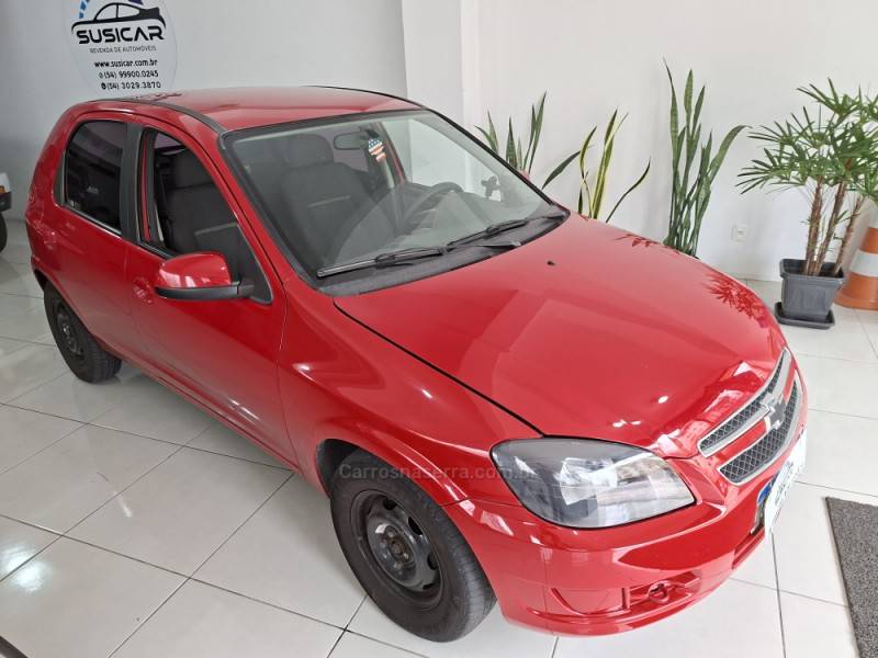 CHEVROLET - CELTA - 2013/2014 - Vermelha - R$ 34.000,00
