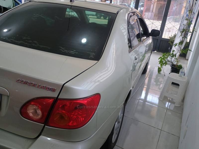 TOYOTA - COROLLA - 2003/2003 - Bege - R$ 34.900,00