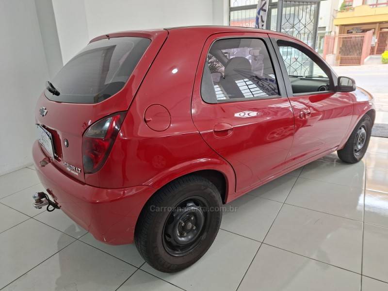 CHEVROLET - CELTA - 2013/2014 - Vermelha - R$ 34.000,00